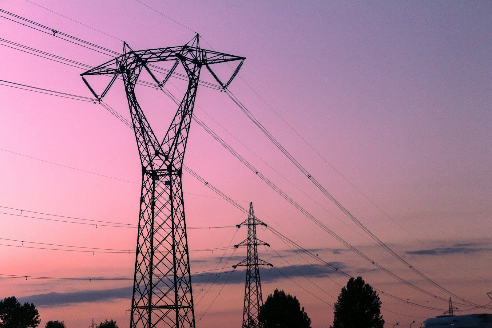 high voltage transmission lines renewable energy grid bottleneck aerial